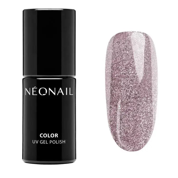 Arctic Blush UV gel polish bottle next to a shimmering pink Cat Eye nail design.