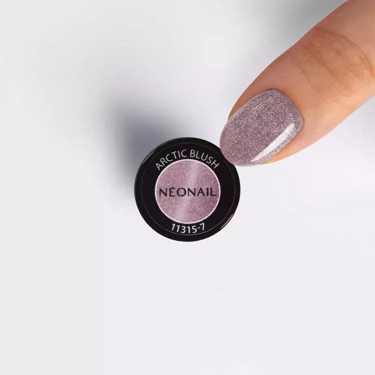 Arctic Blush UV gel nail polish in a container, showcasing elegant Cat Eye design on manicured nail.