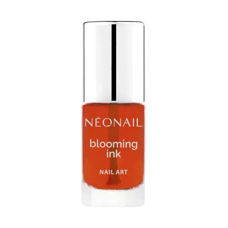 Bottle of Blooming Ink nail art ink in vibrant orange, ideal for gel nail designs and home nail kits.