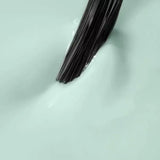 Mint UV gel polish being applied, perfect for DIY manicures and spring nail trends. Ideal for nail care and home nail kits.