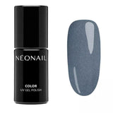 Thrilling Night UV gel polish bottle and swatch, showcasing elegant gray with black particles for stylish gel nails.