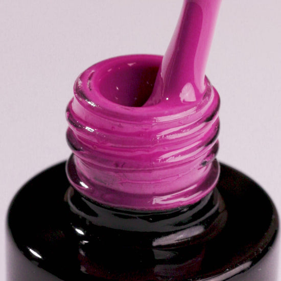 Bottle of Ticket To Anywhere UV gel nail polish in vibrant pink, perfect for autumn 2024 manicure.