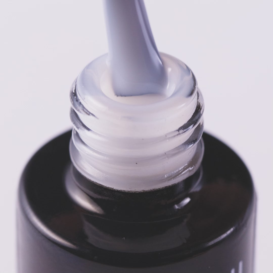 Close-up of Top Milky Effect Creamy UV gel polish, highlighting its smooth consistency and subtle color for elegant nails.