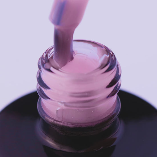 Ballerina Pink UV/LED expert gel polish bottle showcasing light pink consistency ideal for nail applications.