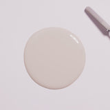 Cool beige UV gel polish for manicures, perfect for Autumn 2024 nail trends.